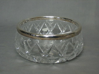 A cut glass bowl with silver plated rim 8"