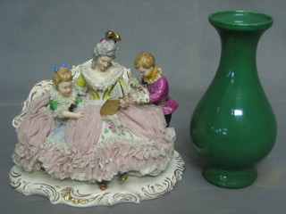 A Continental porcelain figure group with a seated Crinoline lady, 8", 2 Davenport Derby style plates 5 1/2", an Oriental crackle green glazed vase 8", 1 other vase and a porcelain coffee can