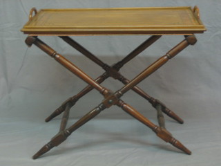 A Victorian turned mahogany folding butler's tray stand together with an associated inlaid walnut twin handled tea tray 30"