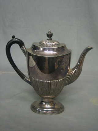An oval silver plated coffee pot with demi-reeded decoration by Mappin & Webb