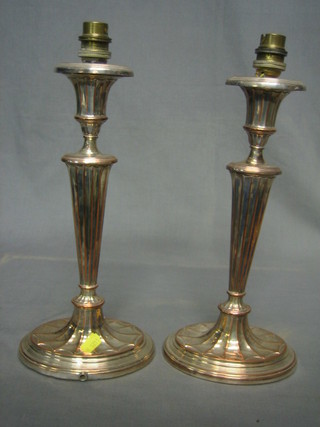 A pair of Edwardian Adam style silver plated candlesticks converted for use as table lamps 13"