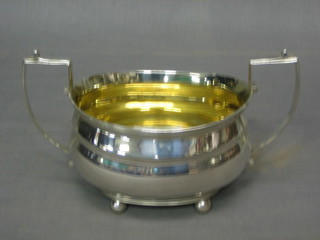 A Victorian silver twin handled sugar bowl, London 1898, 8 ozs