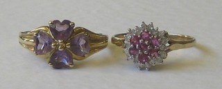 A lady's 9ct gold dress ring set an amethyst coloured stone and a gold dress ring set white and red stones