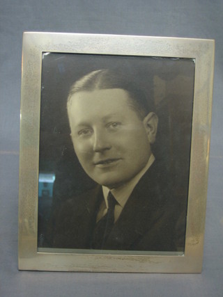 A plain silver easel photograph frame Chester 1939 9 1/2" x 7 1/2"
