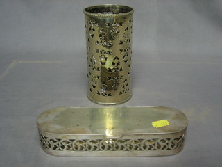 An oval pierced silver box with hinged lid 9 1/2", a pierced cylindrical siphon holder 7" and 2 plated hotelware salt and pepper