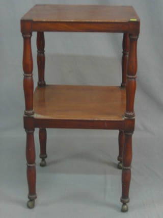A Victorian square mahogany 2 tier what-not stand, raised on turned supports 18"