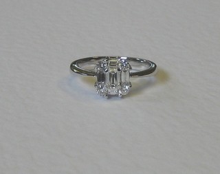 A lady's 18ct white gold dress ring set a princess cut diamond, approx 0.80ct 