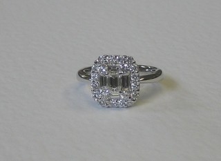 A lady's 18ct white gold cushion shaped dress ring set numerous diamonds approx 1.28ct