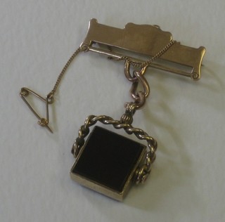 A 9ct gold square double seal hung on a silver brooch