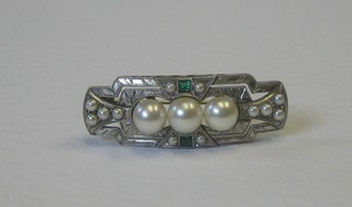An Art Deco white metal brooch set "pearls" and moon stones