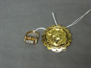 A "French" gold pendant/brooch decorated portrait of a lady and a gold ring set diamonds