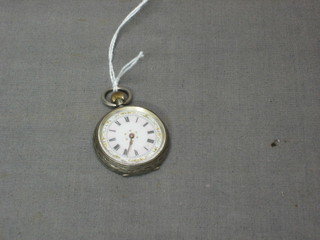 A Continental open faced fob watch contained in a silver case