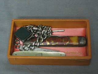 A silver curb link double Albert watch chain, a folding fruit knife with silver blade and mother of pearl grip and a pen knife to commemorate the Queen's Coronation