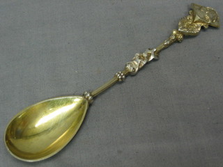 An ornate Continental silver gilt spoon
