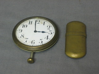 A car clock with enamelled dial and Arabic numerals (chip and crack to dial) together with a Comory brass no. 5 lighter