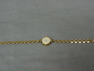 A Bentina lady's wristwatch contained in a gold case together with guarantee