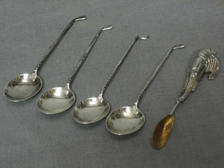 4 silver coffee spoons the handles in the form of golf clubs together with a silver spoon decorated a lobster