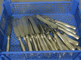 A 24 piece canteen of Continental flatware comprising 12 knives and 12 forks