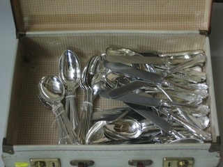 A quantity of silver plated flatware contained in an attache case