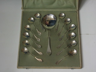 A Continental silver plated 13 piece fruit service with serving spoon and 12 spoons, cased