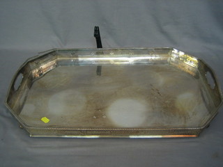 A lozenge shaped twin handled and galleried tea tray 24"
