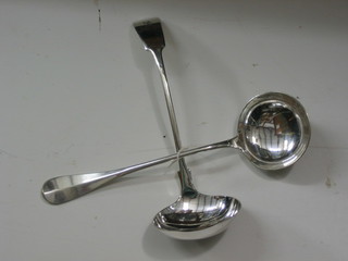 An Old English Rat Tail pattern soup ladle and a fiddle pattern soup ladle with armorial decoration