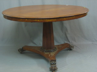A Victorian circular snap top breakfast table, raised on a chamfered column with triform base 47"