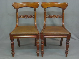 A set of 6 19th Century mahogany bar back dining chairs with carved mid rails and upholstered drop in seats, raised on turned supports