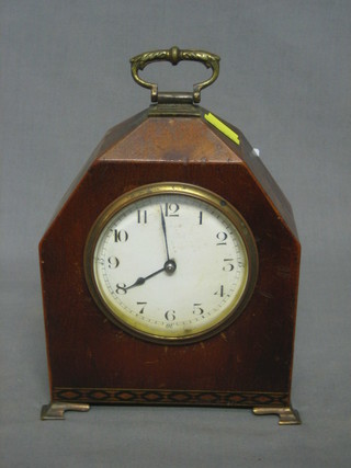 A French 8 day bedroom timepiece with enamelled dial and Arabic numerals contained in a mahogany "lancet" shaped case