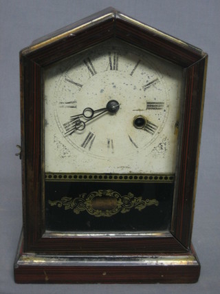A 19th Century American 8 day shelf clock with metal painted dial contained in a rosewood finished case