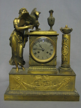 A  19th Century French 8 day striking mantel clock with silvered dial and Roman numerals contained in a gilt metal case decorated a figure, eagle etc