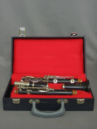 A 3 piece clarinet marked Romille Rondo
