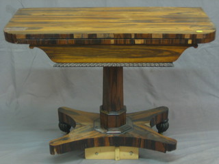 A William IV D shaped Amboyna card table, with hinged lid, raised on bun feet (requires some attention) 36"