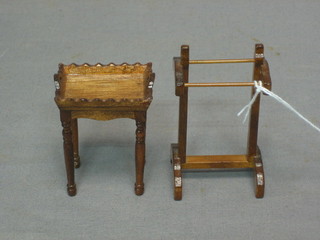 A dolls house mahogany clothes valet and a tray top lamp table