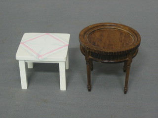 A dolls house circular mahogany occasional table raised on turned supports 3" and a square occasional table 2"