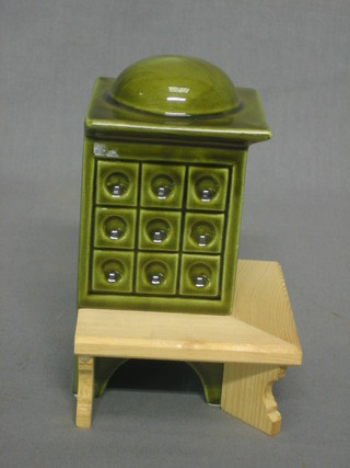 A dolls house green glazed pottery and iron framed Continental corner stove 4"