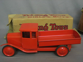 A Triang red painted tipper truck, boxed