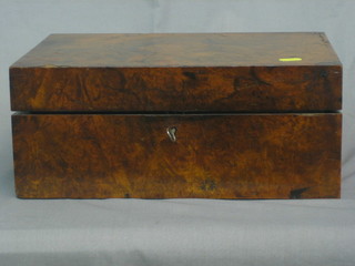 A Victorian figured walnut writing slope with hinged lid 14"
