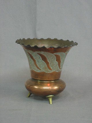 An Art Nouveau circular waisted and embossed copper vase raised on 3 brass feet with hallmark, the base marked Made in London 8"