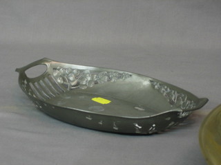 A Continental Art Nouveau pierced oval pewter dish, the base marked A & G Drinit 3147, 10"