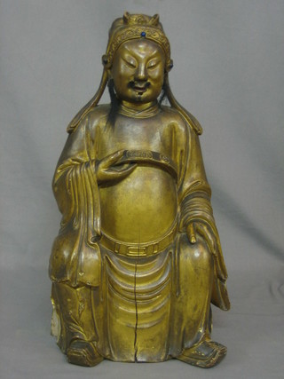 A 19th Century carved wooden figure of a Buddha 19"