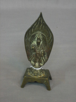 An Eastern bronze shrine with Deity, the back with script 6"