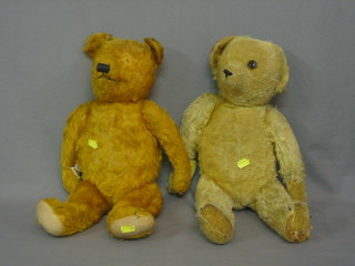A yellow teddybear with articulated limbs 19" and 1 other
