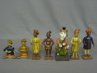 6 various Indian carved wooden and painted figures and 1 other