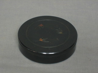 An Art Deco Hardy black cylindrical Bakelite line case with pink cap and decorated flies, 4"