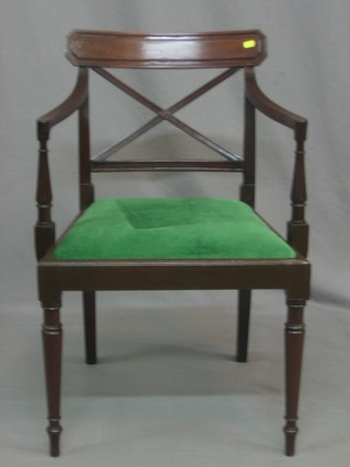 A 19th Century mahogany bar back desk chair with X framed back and upholstered drop in seat, raised on turned supports