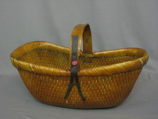An oval wicker basket