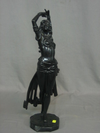 A cast iron figure of a Spanish dancer, the base marked KACNH 1974 20"