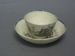 An 18th/19th Century Creamware tea bowl and saucer with transfer decoration, decorated The Tea Party (slight chip to rim of tea bowl and slight chips to saucer)