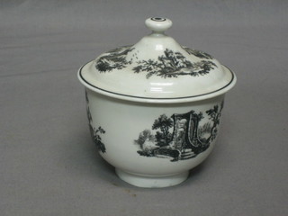 An 18th/19th Century circular Creamware lidded sucrier with monochrome transfer decoration, decorated a temple 5"